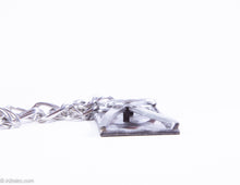 Load image into Gallery viewer, VINTAGE SWANK MIXED METALS ABSTRACT MALE FIGURE MEDALLION SILVERTONE LINK CHAIN NECKLACE - 1960s