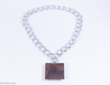 Load image into Gallery viewer, VINTAGE MEN'S SWANK MIXED METALS ABSTRACT FIGURE MEDALLION/PENDANT NECKLACE WITH SILVERTONE CHAIN - 1960s