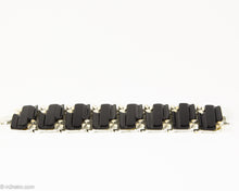 Load image into Gallery viewer, VINTAGE BLACK THERMOSET LUCITE WITH BEIGE ENAMEL LEAVES SILVER TONE LINKS BRACELET/ 1950s