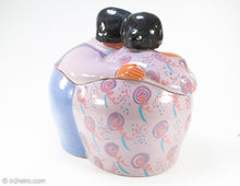 Load image into Gallery viewer, EXTREMELY RARE VINTAGE 'A LITTLE CO' © 1986 HISPANIC COUPLE EMBRACING CERAMIC COOKIE JAR