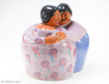 Load image into Gallery viewer, EXTREMELY RARE VINTAGE 'A LITTLE CO' © 1986 HISPANIC COUPLE EMBRACING CERAMIC COOKIE JAR