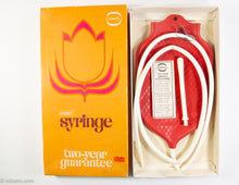 Load image into Gallery viewer, VINTAGE DAVOL COMFY SYRINGE HOT WATER BOTTLE IN ORIGINAL ORANGE BOX