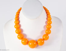 Load image into Gallery viewer, VINTAGE ORANGE PLASTIC GRADUATED BEADS NECKLACE/ NEW OLD STOCK

