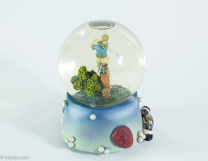 MUSICAL GOLF GLASS SNOW GLOBE OF LADY GOLFER WATER FILLED COLORFUL SPARKLES PLAYS 'TOP OF THE WORLD'