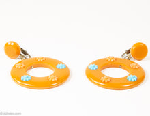 Load image into Gallery viewer, VINTAGE MOD BUTTERSCOTCH BAKELITE EMBELLISHED/ APPLIED POP FLOWERS CLIP-ON DANGLE EARRINGS - 1960s-1970s