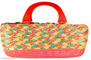 VINTAGE RED, GREEN, AND NATURAL WOVEN STRAW HANDBAG WITH RED WOODEN HANDLES