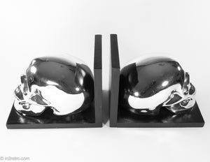 BRIGHT SHINY CHROME SKULL BOOKENDS PERFECT FOR HALLOWEEN!
