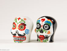 Load image into Gallery viewer, CERAMIC DAY OF THE DEAD/ DIA DE LOS MUERTOS SKULL COUPLE SALT AND PEPPER SHAKERS