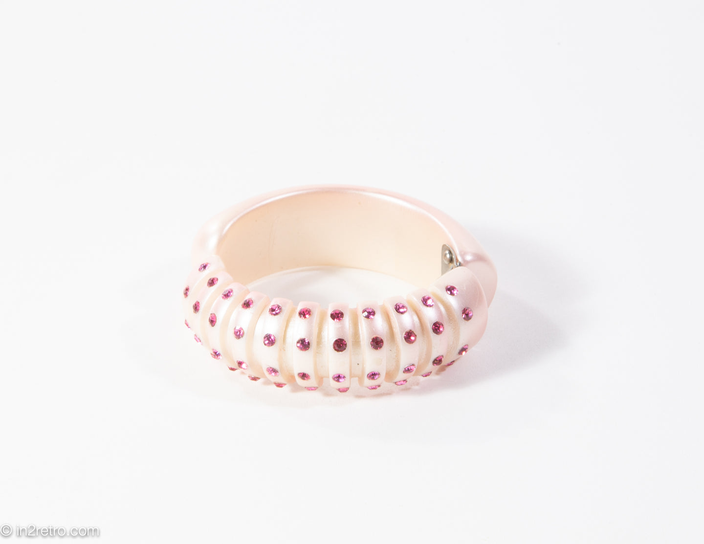 VINTAGE PEARLIZED PINK PLASTIC RHINESTONE CLAMPER BRACELET (UNSIGNED WEISS?) - 1950s