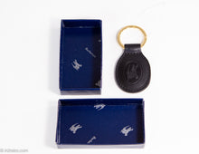 Load image into Gallery viewer, VINTAGE AUTHENTIC BURBERRYS BLACK LEATHER EMBOSSED BRASS KEY RING FOB ITALY/ PRE-1999
