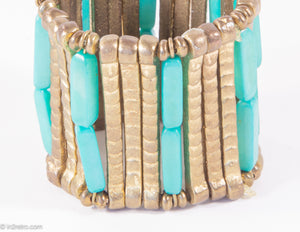 VINTAGE BURNISHED GOLD TONE METAL AND FAUX TURQUOISE BEADS STRETCH BRACELET