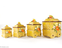 Load image into Gallery viewer, VINTAGE CERAMIC YELLOW FLOWER CART KITCHEN CANISTERS / SET OF 4
