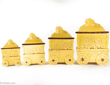 Load image into Gallery viewer, VINTAGE CERAMIC YELLOW FLOWER CART KITCHEN CANISTERS / SET OF 4
