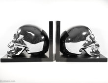 Load image into Gallery viewer, BRIGHT SHINY CHROME SKULL BOOKENDS PERFECT FOR HALLOWEEN!

