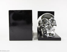 Load image into Gallery viewer, BRIGHT SHINY CHROME SKULL BOOKENDS PERFECT FOR HALLOWEEN!
