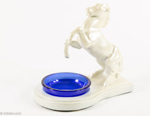 Load image into Gallery viewer, VINTAGE ART DECO (NUART?) METAL REARING HORSE ASHTRAY WITH COBALT BLUE GLASS INSERT
